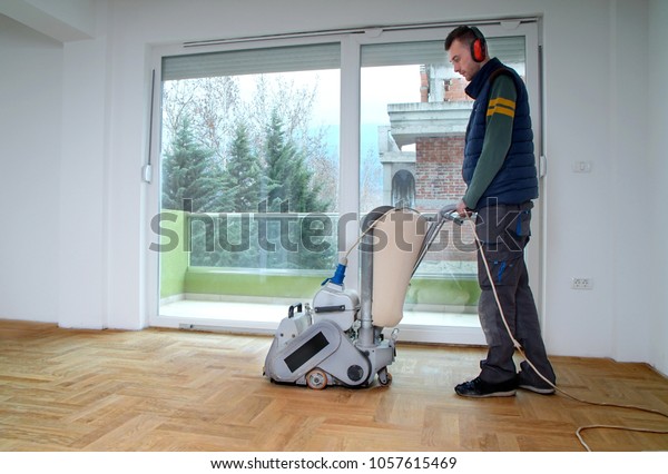 Sanding Hardwood Floor Grinding Machine Repair Stock Photo