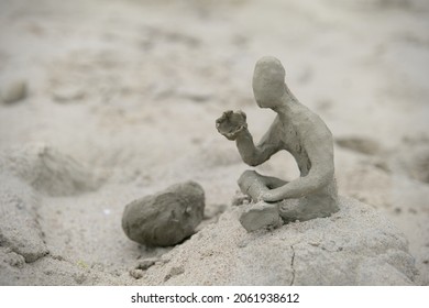 Sandman On The Sea Beach.