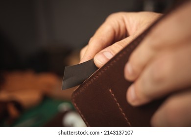 Sandpaper. Tanner Makes Leather Wallet