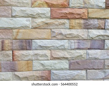 明るい茶色とグレーの色の石ブロック 背景とテクスチャーを持つ外壁の装飾写真素材 Shutterstock
