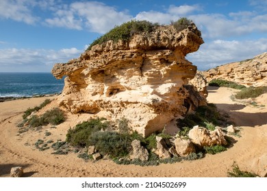 Sandstone Cliff On The Sea Coast With The Road Around It. Mallorca.