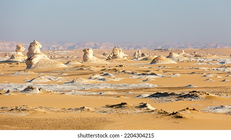 Sandstone Formations In The White Desert At Dawn. Black And White Desert. Egypt.