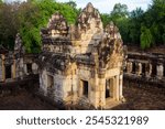 Sandstone Hindu temple in the central courtyard of an 11th century Angkorian site