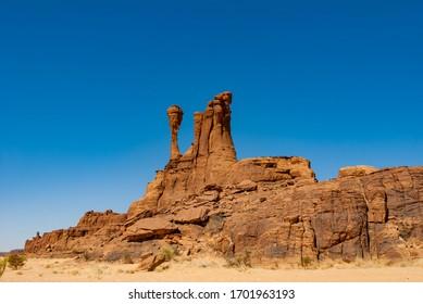 Sandstone Pinnacles In The Sahara Desert, Blue Sky, Chad, Africa