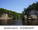 Sandstone rock formations alongside the banks of the Wisconsin River near Wisconsin Dells.