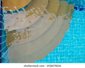 Sandstone Stairs Leading Down To The Pool.