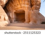 Sandstone tombs in the desert land of AlUla Medina Saudi Arabia in Hegra of UNESCO, World Heritage Site