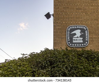 Sandusky, Michigan, USA - September 30, 2017: US Postal Service Emblem On The Side Of The Sandusky, Michigan Post Office. The US Postal Service Employs Over 600,000 Workers.