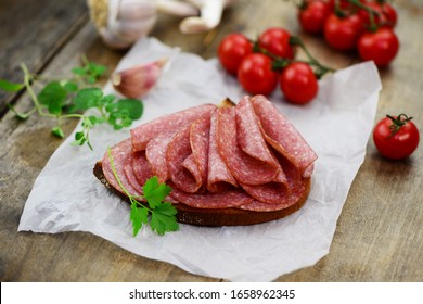 
Sandwich ,
bread topped with salami