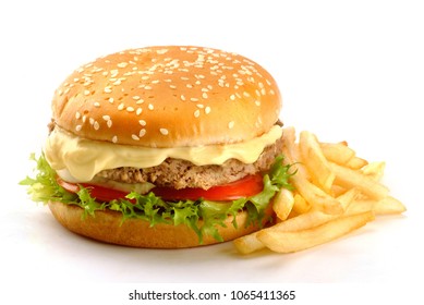 Sandwich With Burger, Mayonnaise, Cheese, Tomatoes, Salad And Chips
