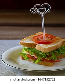 Sandwich Cheese And Thick Ham With Veg. In White Dish And Black Coffee All Put On Wooden Chopping Board / Select Focus, Space For Text

