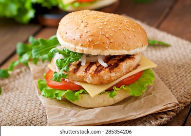 Sandwich With Chicken Burger, Tomatoes, Cheese And Lettuce