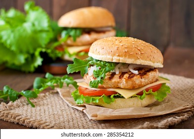 Sandwich With Chicken Burger, Tomatoes, Cheese And Lettuce