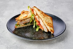 Sandwich With Chicken, Tomato And Cheese Cut On Triangle Pieces