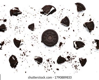 Sandwich Chocolate Cookies With A Sweet Cream With Crumbs Isolated On White Background.   