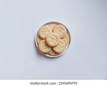 Sandwich crackers with cheese cream inside. Top view or flat lay photography concept. Isolated background in white - Shutterstock ID 2195694793