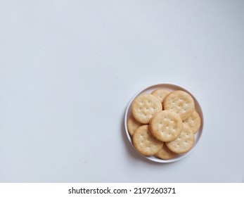 Sandwich crackers with cheese cream inside. Top view or flat lay photography concept. Isolated background in white - Shutterstock ID 2197260371