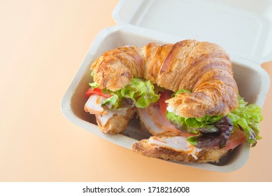 Sandwich Of Croissant Of Lettuce, Tomato And Smoked Turkey