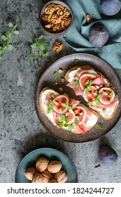 Sandwich With Goat Cheese Spread, Prosciutto, Figs And Chopped Walnuts