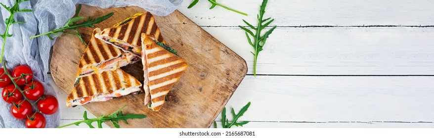 Sandwich With Ham, Cheese, Mustard Leaves, Tomatoes And Onion. Tasty Grilled Sandwiches