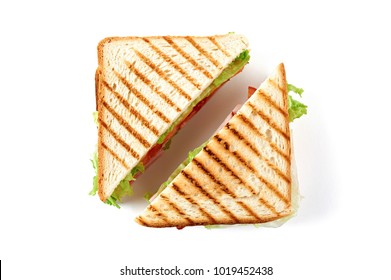 Sandwich with ham, cheese, tomatoes, lettuce, and toasted bread. Top view isolated on white background.