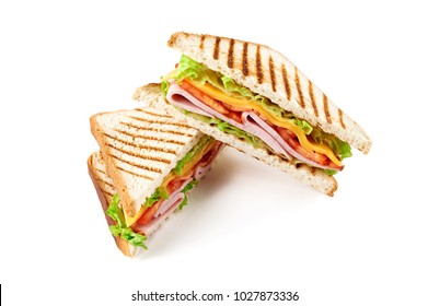 Sandwich With Ham, Cheese, Tomatoes, Lettuce, And Toasted Bread. Above View Isolated On White Background.