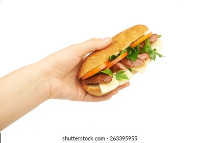 Sandwich In Hand Isolated On White Background