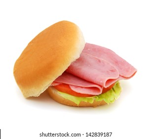 Sandwich With Honey Ham, Swiss Cheese, Lettuce And Tomatoes Isolated On White