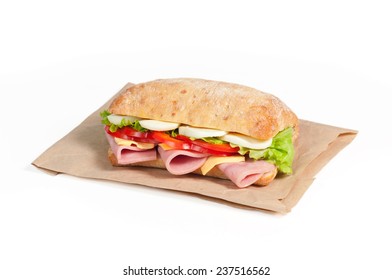 Sandwich On A Paper Bag Isolated On White