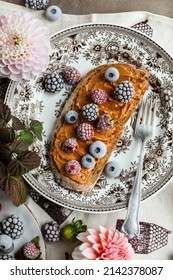 Sandwich With Peanut Butter And Frozen Berries On A Vintage Plate On The Table With Flowers And Leaves. Light Breakfast.