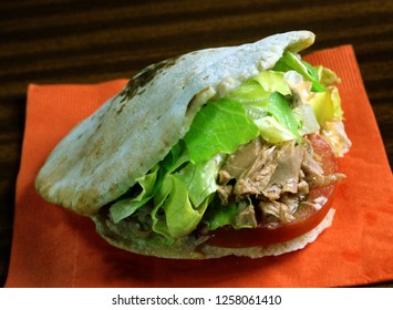 Sandwich With Pita Bread, Tuna, Tomato And Lettuce.