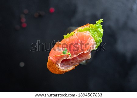 Similar – Image, Stock Photo Smoked Salmon on Baguette