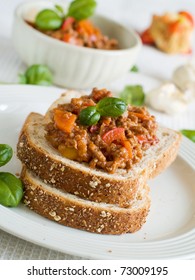 Sandwich Of Savory Ground Beef On Toasted Wholewheat Bread. A Delicious Variety Of A Sloppy Joe.