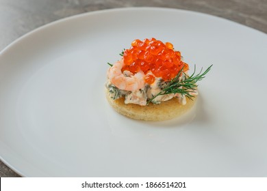 Sandwich With Shrimps And Caviar On White Plate On Dark Stone Table. Toast Skagen - Classic Swedish Appetizer. Healthy Food.