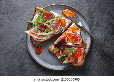 Sandwich Toast With Figs On Cream Cheese With Jam Served On Plate. 