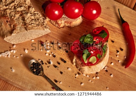 Similar – Image, Stock Photo Bruschetta with cream cheese, cherry tomatoes and basil