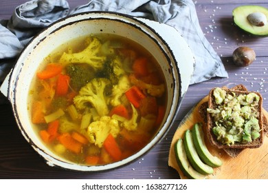 Sandwich Vegetable Soup With Avacado On A Table In A Pan Top View