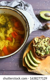 Sandwich Vegetable Soup With Avacado On A Table In A Pan Top View