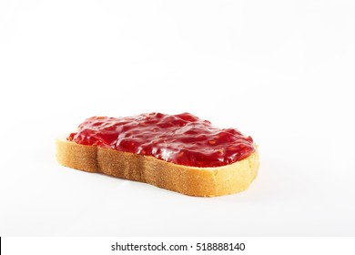 Sandwich Of White Bread And Raspberry Jam On An Isolated Background