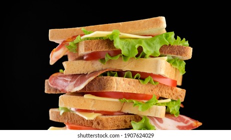 sandwich. yummy club sandwich. large delicious natural sandwich for Breakfast or lunch. making of the fastfood at home