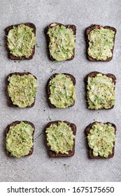 Sandwiches With Avocado, Lemon Juice And Watercress On Gray Background