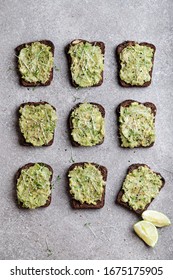 Sandwiches With Avocado, Lemon Juice And Watercress On Gray Background