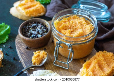 Sandwiches With Butter And Salted Caviar On A Dark Stone Countertop.