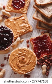 Sandwiches with peanut butter and jelly on the table. vertical 