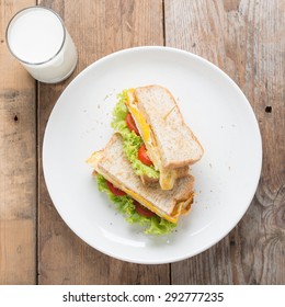 Sandwichs Fried Egg With Cheese And Milk On Wood Table. Breakfast Food, Top View.