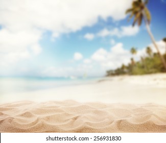 Sandy beach with blur sea on background