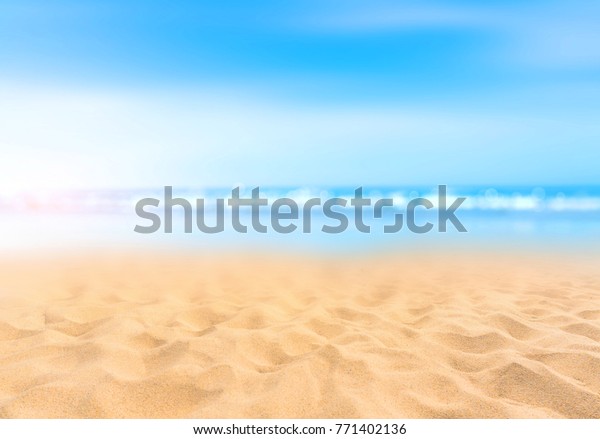 Sandy Beach Blurry Blue Ocean Stock Photo (Edit Now) 771402136