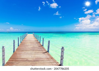 sandy beach and calm blue Caribbean sea surf Dominican Republic