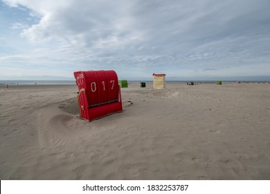 A sandy beach with chairs in Borkum, Germany
