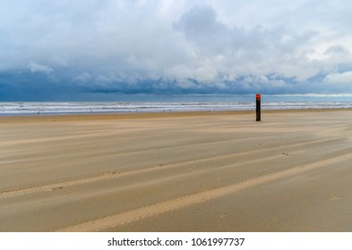 sandy beach with clouds